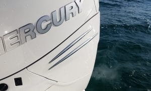 Why does an outboard motor smoke