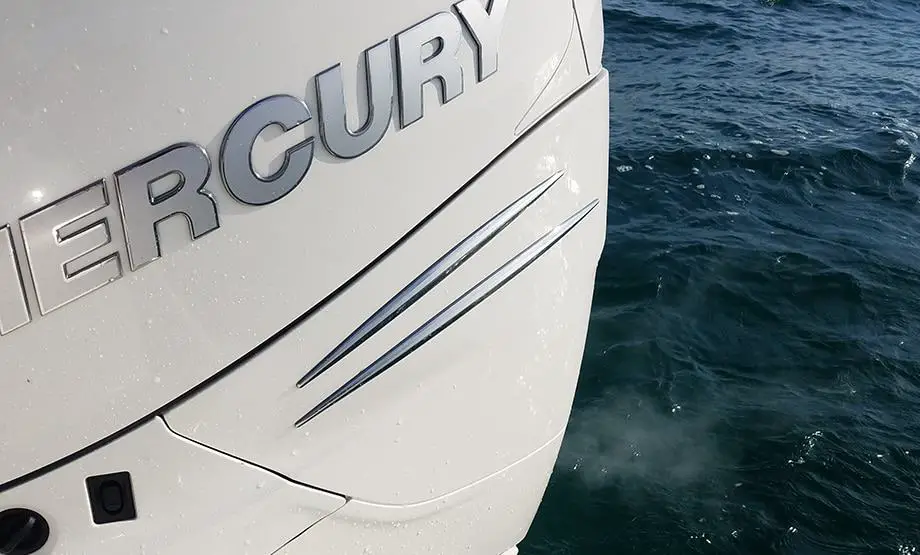 Mercury outboard blowing white smoke